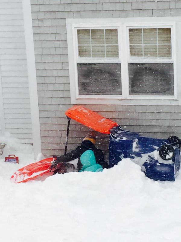 Kids make a snow fort out of the new ABC Disposal recycle bins. COURTESY CHRIS DEMAKIS